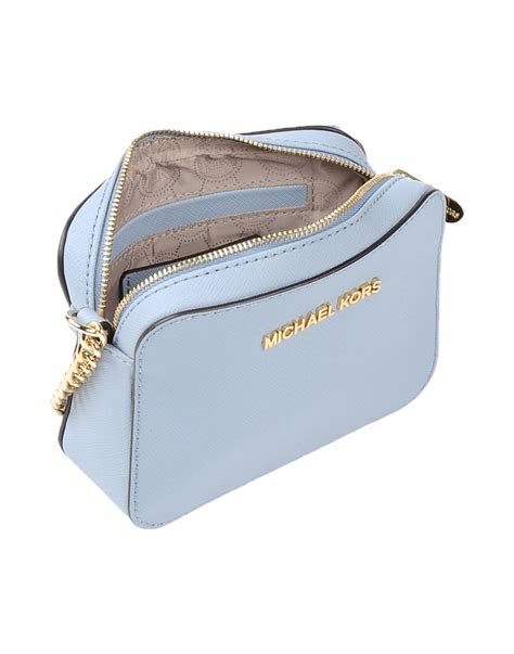 blue michael kors cinch crossbody|Michael Kors blue crossbody.